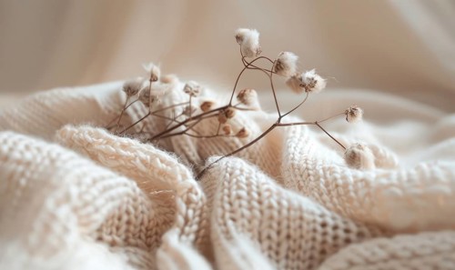 Cotton branch and soft cotton fabric in a soothing neutral tone AI generated