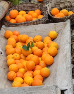 Wooden bowl and baskets with oranges, Rhodes, Greece, Europe