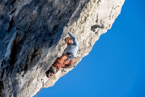 Sport climbing with rope, climber on a rock face, Frauenwasserl climbing garden, Ammergau Alps,