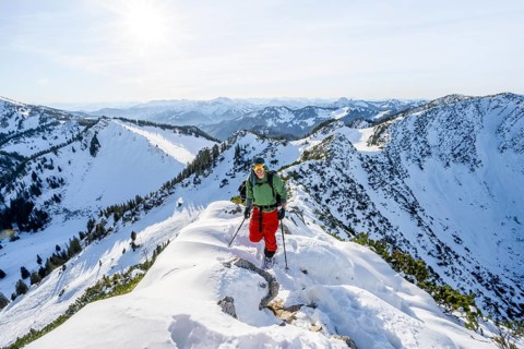 Mountaineer on the ridge of the Aiplspitz in the snow, snow-covered mountain landscape with