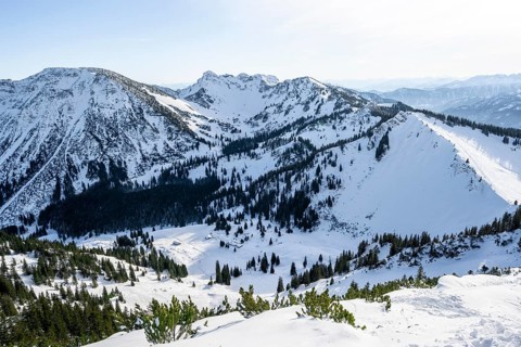View from the summit of the Aiplspitz in winter, snow-covered mountain landscape with the Rotwand