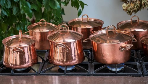 Metal, copper, copper crockery in the kitchen, copper pots, cooking pot