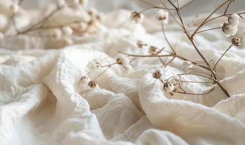 Cotton branch and soft cotton fabric in a soothing neutral tone AI generated