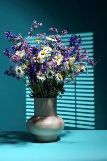 Vase with bouquet of wildflowers