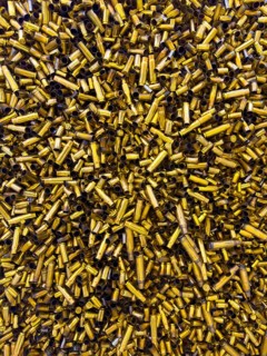 Close Up on a Large Quantity of Empty Different Sizes of Bullet Cartridge Ammunition in Switzerland