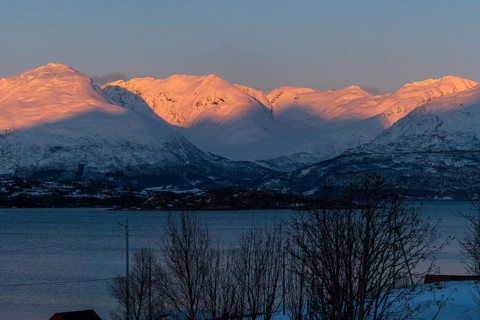 Sunset in the Lyngenfjord with a view of Sorbmegaisa, Norway, Europe