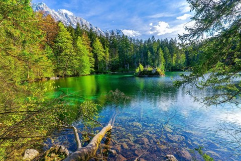 Lake Badersee in spring with Zugspitze group 2962m in the Wetterstein mountains, Zugspitz village