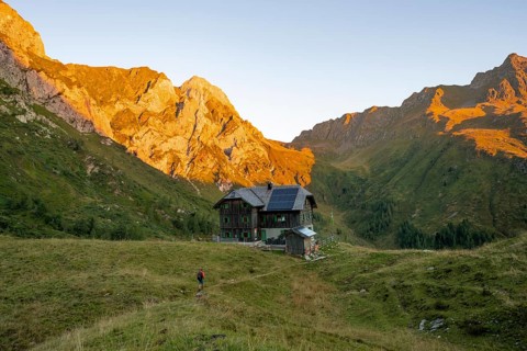 Alpine club hut, Hochweisssteinhaus mountain hut, mountain landscape with green mountain meadows