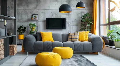 Modern living room in a condo or loft with modern trendy furniture a grey couch and yellow pillows,