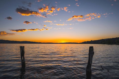 Sunset over Lake Sempach with glowing clouds, Sempach, Lucerne, Switzerland, Europe