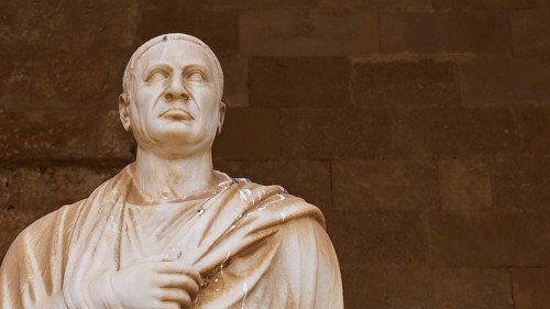Ancient marble sculpture of a man in toga with fine drapery, statue from the 1st century BC,