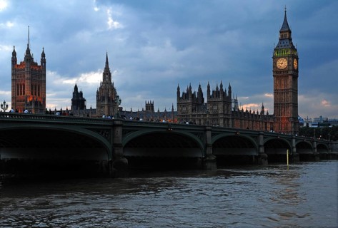 Big Ben with Westminster Hall at dusk in front of Westminster Bridge with the River Thames, London