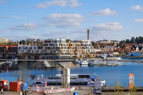 Apartment building at the harbour of the Mueritzsee, Waren, Mueritz, Mecklenburg Lake District,