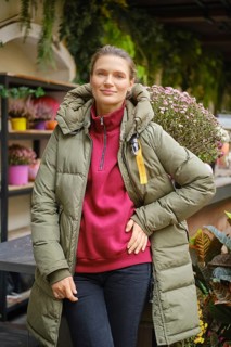 Lovely woman posing on autumn flower county market