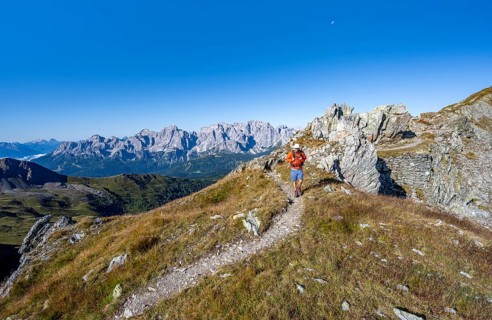 Mountaineers on a hiking trail, old war positions from the First World War, mountain panorama, view