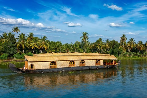 Kerala India tourism travel background, Houseboat on Kerala backwaters in Kerala state of India