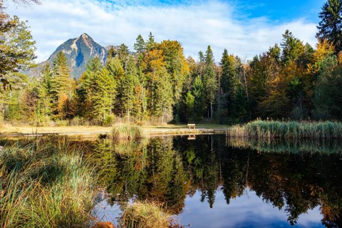Idyllic view of a lake with reflection surrounded by autumn forest and mountains, Kernwald, Kerns,