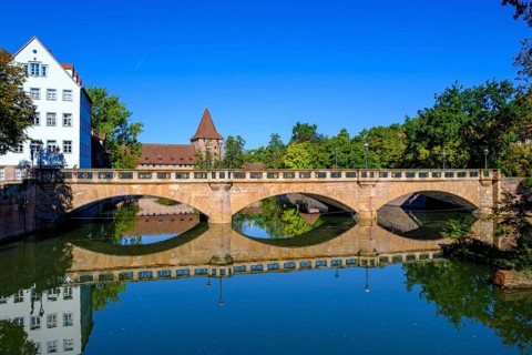 From the Henkersteg to the Maxbruecke, and the Schlayer Tower on the Pegnitz, Nuremberg, Middle
