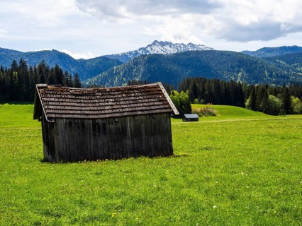 Hay barn on a meadow, with the Kammspitze in the background, near Bad Mitterndorf, Styria, Austria,