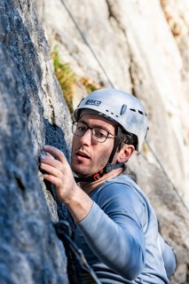 Sport climbing with rope, climber on a rock face, Frauenwasserl climbing garden, Ammergau Alps,