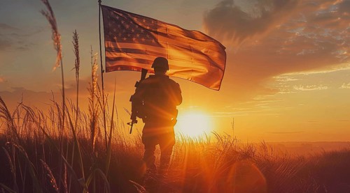 American patriot soldier stand in front of the flag. Concept of fighting for freedom and democracy,