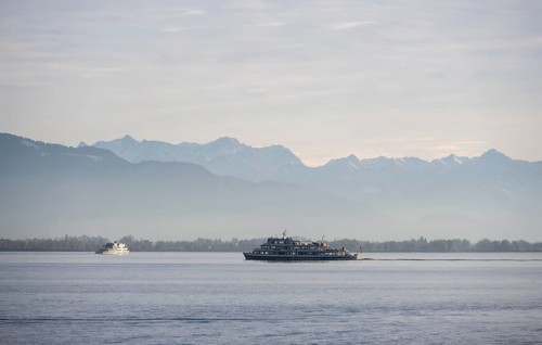 Excursion boat on Lake Constance, snow-covered mountain peaks, Lindau Island, Lake Constance,
