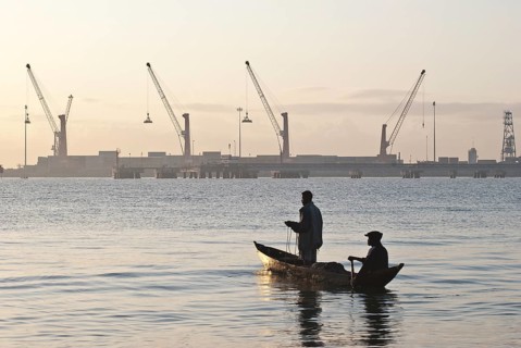 Fishermen on the Indian ocean, commercial port of Toamasina, Madagascar, Africa