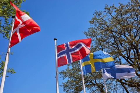 Scandinavian flags of Denmark, Norway, Sweden and Finland in Niebuell, district of Nordfriesland,
