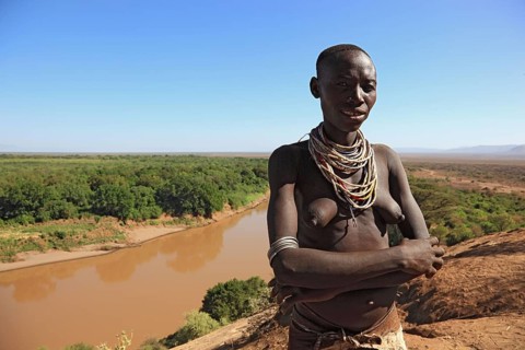 South Ethiopia, Omo region, Omo river landscape, proud woman of the Karo people with necklace,