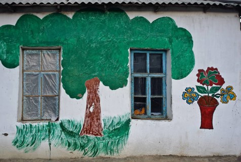 Decorated outer wall of a house, house owned by a nizari ismaili family, painting to commemorate