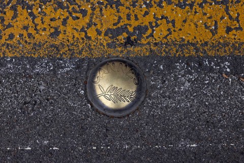 Cannes, France, 14 May 2024: Floor marker with Cannes logo during the opening of the 77th Cannes