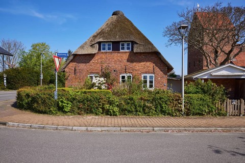 Side view of a Frisian house in Niebuell, Nordfriesland district, Schleswig-Holstein, Germany,