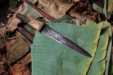 South Ethiopia, among the Dorze people, knife, machete lying on a banana leaf, Ethiopia, Africa