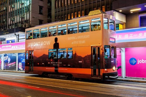 Hong Kong Tramway double-decker public transport at the Pedder Street stop in Hong Kong, China,