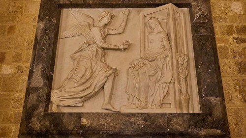 Stone relief of an angel addressing Mary, in a historical style, interior, Grand Master's Palace,