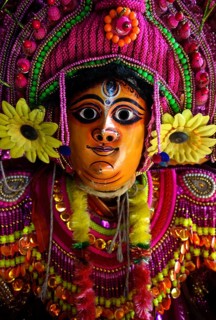 Portrait of a Purulia Chhau dancer playing the role of the hindu goddess Durga, West Bengal, India,