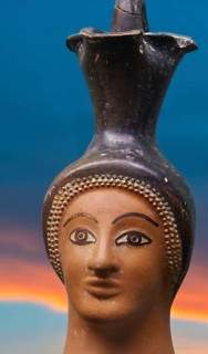Oinochoe, ancient Greek wine jug with handle in the shape of a woman's head, motif cropped and