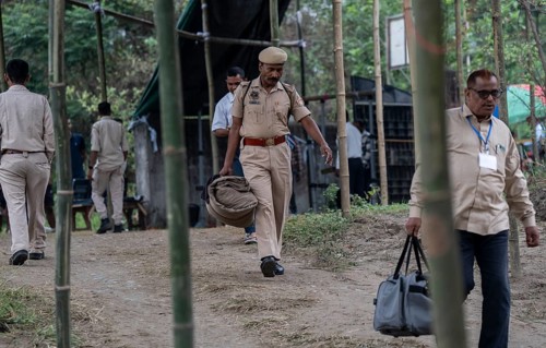 Barpeta, India. 6 May 2024. Police personnels arrives with luggage to leave for allocated polling