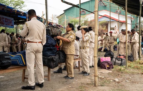 Barpeta, India. 6 May 2024. Police personnels arrives with luggage to leave for allocated polling