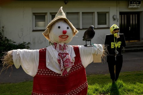 Scarecrows at the parish hall of the Protestant church in Unterburg, Solingen, Bergisches Land,
