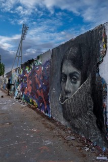 Germany, Berlin, 21.04.2024, Sunday afternoon in Mauerpark, graffiti wall, face of a woman with a