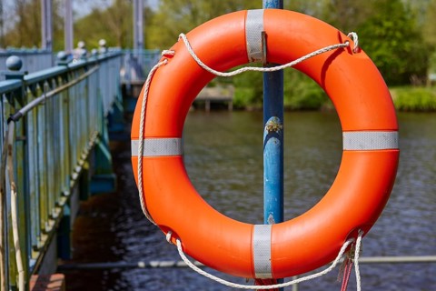 Lifebuoy at the Blue Bridge in Friedrichstadt, Nordfriesland district, Schleswig-Holstein, Germany,