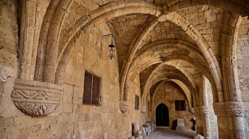 A stone corridor with a vaulted ceiling in a medieval fortress, outdoor area, Archaeological