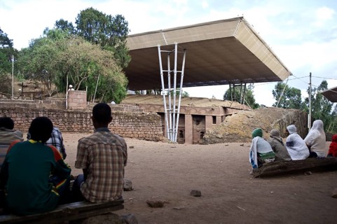 Mass in front of bet Medhane Alem church, major orthodox christian pilgrimage site, Lalibela,