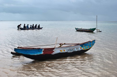 Tourists boating to visit the lagoon, Indian ocean at Foulpointe, Madagascar, Africa