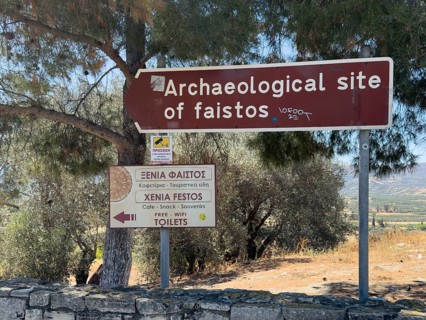 Tourist sign on archaeological site of Phaistos Palace excavation site of Minoan culture of