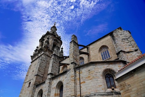 The church Iglesia de San Anton at the river Nervion in Bilbao, Gothic bell tower of a church under