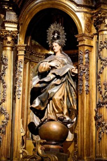The Iglesia de San Anton church on the Nervion river in Bilbao, A magnificent statue of the Madonna