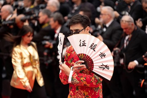 Cannes, France, 14 May 2024: Miles Moretti with fan during the opening of the 77th Cannes