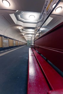 Empty underground station with red benches and bright lighting, Berlin Airlift, Germany, Europe